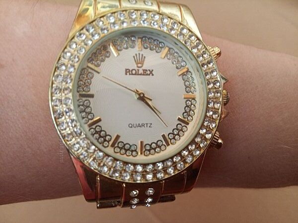 Жіночий годинник Rolex.