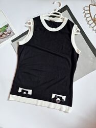 Tuzzi гарна кофтинка р 14