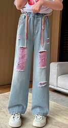 Джинсы стильные, широкие с розовыми вставками, рванные 146-158р на резинке