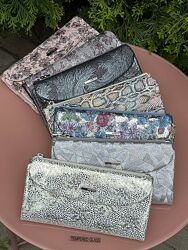 Гаманці жіночі купюрники на магнітах шкіряні Karya