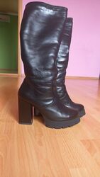 Зимние кожаные сапоги