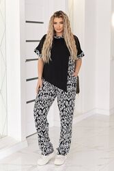 Жіночий костюм. Розміри вiд 50 до 64