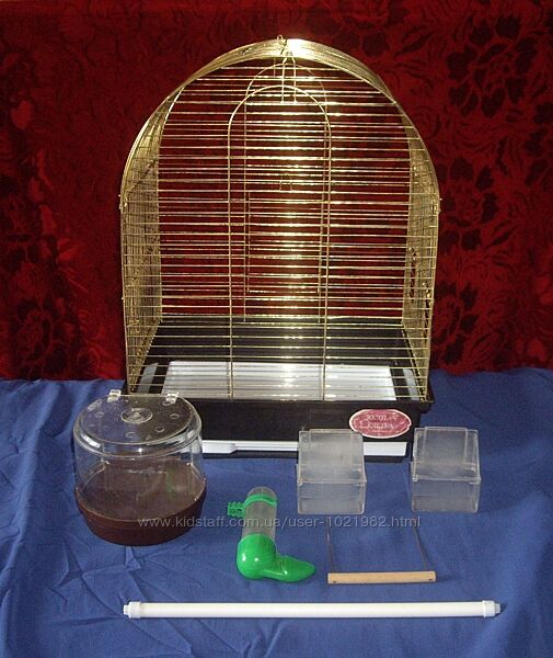 Клітка для птахів з аксесуарами