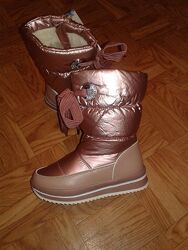 Чоботи, дутики 