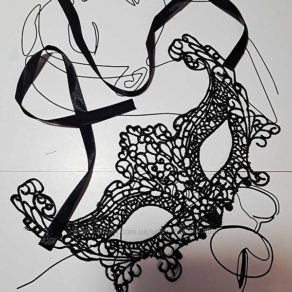 Карнавальна мереживна маска.