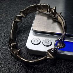 Вінтажні кручені металеві браслети-розтяжки 70-х/80-х років